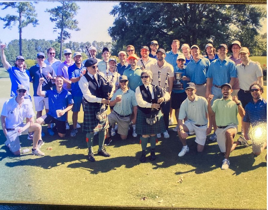 Large Coastal Golfaway golf group with bagpipers after a Myrtle Beach round