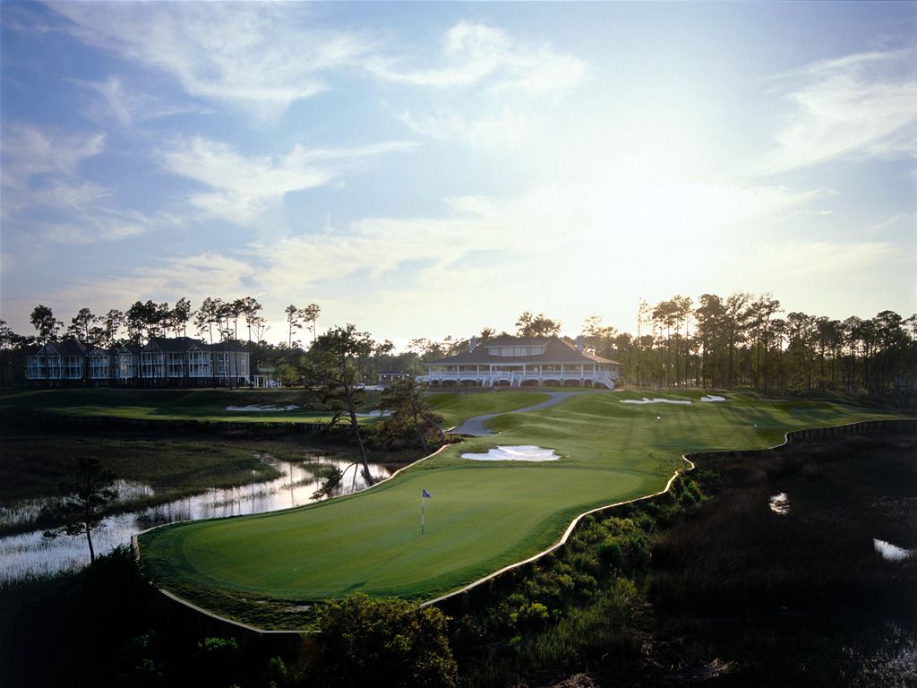 Rivers Edge Golf Club clubhouse and marsh-side green in Shallotte, North Carolina
